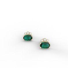 Dress up with these sophisticated pair of emerald earrings full of sparkle and chic`They look so perfectly beautiful they are an instant classic.Make a beautiful statement wherever you go!- Made to Order, perfectly finished, Fast shipping fully insured and trackable online.- Emerald information: Two 6x4mm oval cut Chatham Emeralds 1.02 ctw- Diamond information: 6 x Diamonds, VS-E, 0.08 ctw- Arrives gift ready with a certificate of authenticity. Elegant Green Diamond Earrings In 14k Gold, Green Emerald Diamond Earrings, Green Diamond Earrings For May Birthstone, Emerald Earrings Gold, Green Stud Earrings, Emerald Earring, Emerald Earrings Studs, May Birthstone, Gold Stud Earrings