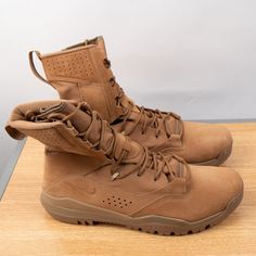 Nike Sfb Field 2 8" Tactical Boots Suede Leather Brown Size 13. The Nike Sfb Field 2 8” Is A Lightweight High-Performance Boot Designed To Support Heavier Loads In All Theaters. The Sole Is Equipped With An Aggressive Tread Pattern That Provides Exceptional Traction Over Challenging Terrain, While An Internal Rock Shield Helps Prevent Punctures. Tactical Combat Boots With Abrasion-resistant Round Toe, Tactical Leather Hiking Boots Slip-resistant, Tactical Leather Hiking Boots With Slip Resistance, Tactical Brown Hiking Boots, Nike Leather Work Boots With Vibram Sole, Impact Resistant Leather Combat Boots, Combat Leather Hiking Boots With Abrasion Resistance, Leather Combat Hiking Boots With Abrasion Resistance, Leather Combat Hiking Boots Abrasion-resistant