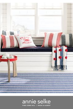 the cover of annie selke's new book, featuring red and white striped pillows