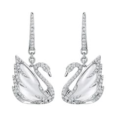 SWAROVSKI FAITHFUL SWAN EARRINGS. Amazing expression of swan symbolizes the purity of love. - 18K White Gold - 2ct engraved Rock Quartz and Diamond Setting - Size: 2.9 cm New without Tags (never worn) *Swarovski box included RETAIL: $5,000 Duchess Swan, Swan Earrings, Swarovski Butterfly, Swan Jewelry, Dr Accessories, Swarovski Swan, Boot Jewelry, White Swan, Girly Accessories