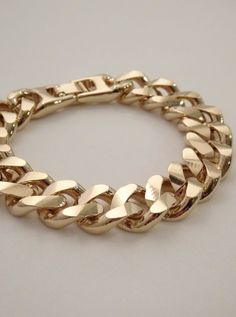 The Kennedy Chain Bracelet is tough as nails! This unisex gold chain bracelet is dressed to impress. It features bold diamond cut chain links and is a go-to favorite women's or men's gold chain link bracelet. Styles great worn solo or stacked! Stack this bracelet along with these for a bold new look! - The Elliot Chain Bracelet - The Asher Chain Bracelet - The Benjamin Chain Bracelet Available in 24K gold or rhodium plating over steel Patent plating & sealant technology to ensure durability and Feminine Accessories, Bracelet Styles, Jewelry Promotion, Gold Chain Bracelet, Tough As Nails, Gold Chains For Men, Chain Links, Gold Bracelet Chain, Jewelry Pins