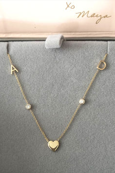 The original Asymmetrical Letter Necklace has been a brand favorite since its launch in 2008. It has been spotted on Meghan Markle, Mila Kunis (among others) and now you! Choose from letters, charms and birthstones to build a necklace that is uniquely yours. 

Made to order in Los Angeles
Each necklace is solid 14k gold
Letters measure 1/4”
Stones are 2.5 mm in a 3mm bezel
Our signature .20 gauge chain has a lightweight feel Custom Gold Necklace, Mila Kunis, Gold Letters, Letter Necklace, Meghan Markle, And Now, Gold Necklace, Product Launch, Charms