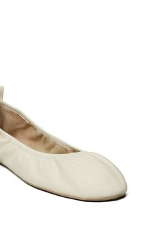 Complete your look with the effortless sophistication of a classic ballet flat shaped from smooth leather. Leather upper and lining/synthetic sole Imported Calf Leather Ballet Flats With Removable Insole, Classic Cream Leather Ballet Flats, Chic Ballet Flats With Leather Sole, Cream Leather Ballet Flats For Spring, Cream Ballet Flats With Removable Insole And Almond Toe, Cream Leather Slip-on Ballet Flats, Classic Slip-on Calf Leather Ballet Flats, Cream Leather Closed Toe Ballet Flats, Cream Leather Ballet Flats For Work