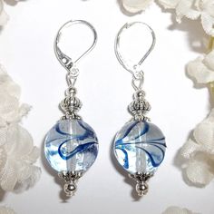 This Gorgeous Beaded Earring Set Was Done With Clear Glass Beads With Navy Blue Swirls. The Pair Have Silver Toned Costume Jewelry Beads That Were Antiqued In Black. They Dangle And Drop From 925 Sterling Silver Lever Backs For Women's Pierced Ears. Measure 1 3/4 Inches Tall & Almost 5/8 Inches Wide. Each Single Earring Weighs 4.3 Grams. A Cute Set To Wear With Denim Jeans! Brand New & Handmade By Me - Wvluckygirl. Great Gift Idea For Her! Buy It Now Before Someone Else Does!!! Dangly Dangling E Nickel-free Blue Beaded Earrings For Gifts, Nickel-free Blue Beaded Earrings As Gift, Elegant Light Blue Beaded Dangle Earrings, Elegant Light Blue Beaded Earrings For Party, Blue Teardrop Jewelry With Silver Beads, Elegant Light Blue Beaded Earrings, Blue Round Beaded Earrings For Gift, Blue Beaded Earrings For Gifts, Blue Round Beaded Earrings As Gift