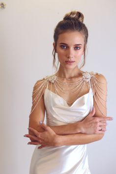 Wedding Shoulder Jewelry, Lace Bridal Epaulettes Sleeves, 
https://sharonguy.co.il/products/wedding-shoulder-jewelry-lace-bridal-epaulettes-sleeves-crystal-shoulder-necklace-wedding-dress-sleeves-add-on-rhinestone-cover-up 
Studio Sharon Guy #Bestseller Shoulder Chain Jewelry, Shoulder Jewelry, Shoulder Necklace, Bridal Accessory, Bridal Tops, Bridal Separates, Bridal Gloves, Rhinestone Chain, Art Deco Necklace