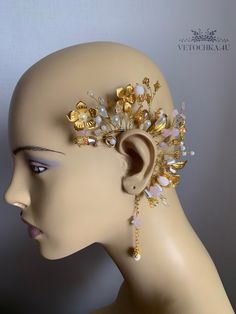 Handmade ear cuff gold color will definitely make your outfit so wild! Slip on an ear cuff for a look that will transform your ear immediately!  This is a perfect bridal Fantasy cuff earring created with  crystal beads and metal  butterflies, flowers, moonstone, quartz My jewelry design is inspired by nature and made with the highest attention to detail and quality Be beautiful and unique with Vetochka4U jewelry! Decor - all length 13 cm = 5 inch Length ear cuff 6 cm = 2,3 inch Chain 8 cm = 3,14 inch Standard size The base of the cuff is flexible and you can give any shape! It's very comfortable and easy to wear. Price is for a single piece.  Ready to ship in 1-3 business days.  Each item is in a free gift box. You don't have to worry about presentation of your gift For any questions pleas Adjustable Gold Cartilage Earrings For Party, Gold Solitaire Ear Cuff For Wedding, Gold Single Earring Ear Cuff For Wedding, Gold Ear Cuff For Pierced Ears For Party, Gold Pierced Ear Cuff For Party, Elegant Adjustable Ear Climbers For Party, Adjustable Gold Ear Cuff For Party, Whimsical Adjustable Ear Cuff As Gift, Whimsical Adjustable Ear Cuff For Gift