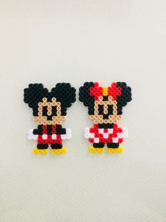 mickey and minnie mouse earrings made out of legos