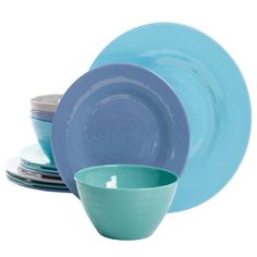 the blue dishes are stacked on top of each other, with one bowl at the bottom