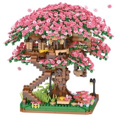 a lego tree with pink flowers on it