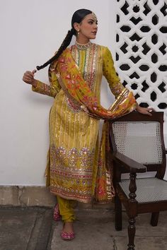 Yellow silk kurta with all over sequins, zardozi, zari, floral butti embroidery. Paired with a pant and dupatta with contrast embroidered buttis. - Aza Fashions Navratri Silk Traditional Wear With Sequins, Silk Kurta With Sequins For Festivals, Traditional Silk Salwar Kameez With Sequins, Festive Silk Salwar Kameez With Sequins, Silk Salwar Kameez With Sequins For Festivals, Bollywood Style Silk Salwar Kameez With Sequins, Traditional Silk Wear With Sequins, Traditional Silk Sequined Wear, Traditional Raw Silk Dupatta With Sequins