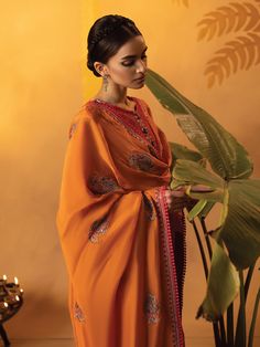 Brand: Faiza FaisalProduct Code: Ilse | 3 PC StitchedCollection: Faizal Faisal Signature Pret Festive Collection DESIGN DETAILS: Shirt:Organza Inner: Thai Silk Dupatta:Medium Silk Trouser:Thai Silk Goan Description Small Medium Large Front Length 50 50.0 50 Sleeve Length 22.0 22.5 23 Sleeve Opening 5.0 5.5 6 Border Hem 28.0 29 30 Shoulder 14 14.5 15.5 Bust 19.0 20.0 22 Hip 23.5 24.0 25 Shirt Description Small Medium Large Front Length 47.0 47 47 Border Hem 26.5 27.5 28.5 Shoulder 14 14.5 15.0 Bust 19 20.0 22 Hip 23.0 24.0 25 Trouser Trouser Length 34 34.5 35.0 Trouser Waist 14 14.5 15 Trouser Bottom 12.0 12.5 13.0 DISCLAIMER: Lining, Laces, and Tassels are not included in unstitched variants. Embellishment items in stitched outfits are subject to market availability The actual colors of th Traditional Silk Palazzo Set With Dupatta, Traditional Orange Palazzo Set With Drape, Traditional Drape Orange Palazzo Set With Dupatta, Orange Palazzo Set With Dupatta And Traditional Drape, Traditional Orange Palazzo Set With Dupatta, Orange Silk Sets With Cutdana Details, Orange Silk Sets With Cutdana, Orange Resham Embroidery Dupatta, Traditional Naqshi Sharara In Georgette