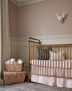 a baby's crib in the corner of a room