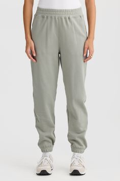 Comfort meets style with the Lena Track Pant Dusty Olive. Crafted from 100% mid weight Terry Cotton, these track pants are a must have addition to your athleisure collection. 100% Cotton French Terry Classic track pant with elasticated waist and design seam detailing Embroidered classic logo Elasticated cuffs Cutaway pockets Leisure Pants With Ribbed Waistband, Relaxed Fit High-waisted Sweatpants With Elastic Waistband, High-waisted Relaxed Fit Pull-on Sweatpants, Relaxed Fit High-waisted Pull-on Sweatpants, High-waisted Relaxed Fit Sweatpants, Relaxed Tapered Leg Joggers With Pockets, Comfortable High-waisted Sweatpants With Elastic Waistband, Joggers With Elastic Side Panels In Solid Color, Relaxed Fit Pull-on Tapered Leg Sweatpants