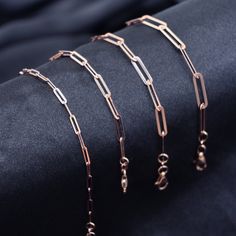 "Adorn your wrist with the modern allure of our 14K Solid Rose Gold Paperclip Chain Bracelet. Meticulously crafted with genuine 14K rose gold, this bracelet showcases a delicate and chic design that adds a touch of sophistication to any ensemble. These Chain Bracelet are 100% Authentic 14K Solid Gold \"Not Plated or Filled\"  -Material: Real Solid 14K Gold  -Polished Average Weight Based on 7\" 2mm - 1.50grams  2.6mm - 1.80 grams  3.2mm - 2.10 grams  3.8mm - 2.25 grams Length: Selectable Width: Selectable Clasp/Bail: Lobster Lock Material: Handcrafted from authentic 14K rose gold, this paperclip chain bracelet radiates the warm and rosy hue unique to rose gold. The dainty paperclip links interlock beautifully, creating an elegant and versatile piece of jewelry. Timeless Rose Gold: The time Rose Gold Oval Link Paperclip Bracelet, Modern Rose Gold Chain Bracelet With Rectangular Links, Classic Rose Gold Paperclip Bracelet With Rectangular Links, Modern Rose Gold Box Chain Bracelet, Elegant Rose Gold Link Paperclip Bracelet, Minimalist Rose Gold Link Paperclip Bracelet, Modern Rose Gold Paperclip Chain Bracelet, Formal Rose Gold Oval Link Bracelets, Formal Rose Gold Chain Link Bracelet