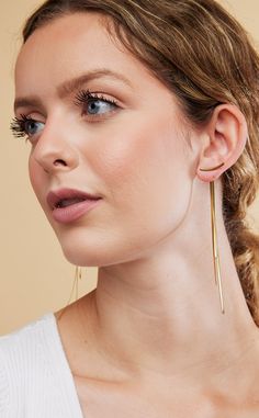 Add an elegant touch to your outfit with these Fashion Vintage Glossy Arc Geometric Long Thread Tassel Drop Earrings for Women. Made with Copper as the base metal, they boast a timeless design that will never go out of style. Elevate your look with these statement earrings. Hypoallergenic: Perfect for sensitive skin, ensuring maximum comfort. Tarnish Free: Long-lasting shine and beauty, resistant to everyday wear and tear. Alloy Free: Made without harmful alloys, ensuring quality and durability. Elegant Metal Ear Cuff For Party, Elegant Metal Ear Cuff For Formal Occasions, Elegant Metal Ear Cuff For Formal Events, Chic Metal Ear Cuff, Elegant Metal Ear Cuff For Evening, Sleek Metal Drop Earrings, Elegant Gold Metal Ear Climbers, Elegant Everyday Ear Climbers, Elegant Adjustable Metal Ear Cuff