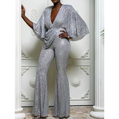 Season:Winter,Fall; Fabric:Polyester; Sleeve Length:3/4 Length Sleeve; Look After Me:Machine wash; Gender:Women's; Style:Disco,Elegant,Formal; Elasticity:Micro-elastic; Occasion:Party,Wedding,Street,Bar,Going out; Fit Type:Regular Fit; Pattern:Solid Color; Design:Sequin,High Waist; Neckline:V Neck; Special Size:Normal; Jumpsuit Type:Jumpsuit; Front page:FF; Listing Date:09/06/2023; Production mode:External procurement Socialite Style, Party Jumpsuit, Loose Jumpsuit, Sequin Party, Backless Jumpsuit, Jumpsuit Party, Jumpsuit Trousers, Silver Sequin, Half Sleeve