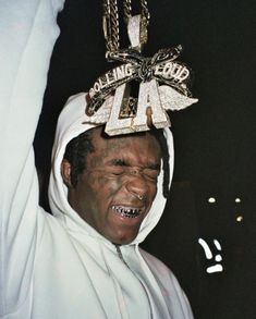 a man with a crown on top of his head