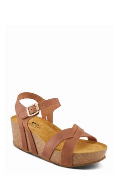 A cork-wrapped platform and chunky wedge heel elevate a weekend-ready leather sandal fitted with an adjustable strap at the ankle. 1 3/4" heel; 1 1/4" platform Adjustable ankle strap with hook-and-loop closure Molded footbed Leather upper and lining/synthetic sole Made in Spain Chunky Wedges, Baby Gear Essentials, Brown Fits, Rollerball Perfume, Fragrance Design, Platform Wedge Sandals, Platform Wedge, Wedge Sandal, Sandal Women