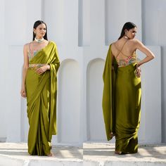 Experience the perfect blend of elegance and comfort with this exquisite Satin Silk saree, showcasing a captivating lime color and flat gold pendants. The lustrous satin weave imparts a glamorous touch, making it suitable for various occasions, such as Indian weddings, festivals, and parties. Complement it with one of our ready-made blouses for a stunning appearance. Delight in the convenience of a ready-to-wear saree with complimentary Fall & Pico, and savor the soft, draping material's unparalleled comfort. Preserve this piece's beauty with dry cleaning and steam or medium-heat ironing. ➛ Material: Crafted with premium quality Satin Silk material ➛ Comfortable: Exceptionally soft, draping smoothly over your skin and providing unmatched comfort ➛ Unique Lime Color: A playful yet elegant n Green Pre-draped Saree For Wedding, Designer Silk Draped Saree, Green Draped Lehenga With Cutdana, Green Draped Saree For Wedding, Bollywood-style Draped Wedding Blouse Piece, Green Draped Saree With Unstitched Blouse, Green Draped Dupatta For Wedding, Designer Chanderi Pre-draped Saree In Pista Green, Draped Chanderi Saree With Dupatta