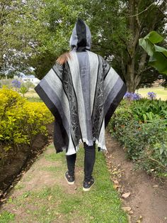 Our beautiful alpaca ponchos are perfect for a casual chilly day or can be dressed up for an evening out. The ponchos are a pullover style with a hood and you will love the coziness of the alpaca wool. The ponchos have grey tones with a tribal print. Size Length: 35 in Width: 43 1/2 in Materials 70% Alpaca & 30% Acrylic Satisfaction Guarantee We want you to love your new Fancy Alpaca product as much as we do and if you do not we accept returns on our products. Benefits of buying Fancy Alpaca pro Casual Alpaca Poncho For Winter, Fashion Poncho, Alpaca Poncho, Boho Poncho, Artisan Fashion, Wool Poncho, Christmas Clothing, Wool Clothing, Poncho Style