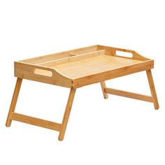 a wooden tray sitting on top of a table