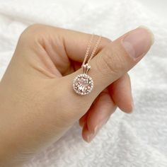 14K Round Morganite Diamond Necklace / Morganite Pendant / Morganite Necklace / Rose Gold / Diamond Necklace / Necklace for Women ◈ Please check our shop ---> https://etsy.me/3l5L3fn ◈ Necklace Shop ---> https://etsy.me/3QzCmci ◈ Item Details ◈ --- Handmade in United States --- Made to Order --- Metal: Solid 14K Gold (Rose Gold) --- Pendant Size: 17 x 11 mm (With Bail) --- Center Stone: Natural Round Morganite --- Center Stone Size: 8 mm --- Center Stone Carat Weight: Approx: 2.3 CT --- 100% Rea Luxury Pink Gold Morganite Jewelry, Elegant Pink Gold Morganite Jewelry, Rose Gold Cubic Zirconia Round Necklace, Elegant Morganite Gemstone Jewelry, Oval Morganite Jewelry In Pink Gold, Dazzling Rose Gold Necklace With Prong Setting, Fine Jewelry In Pink Gold With Halo Setting, Elegant Round Cut Morganite Jewelry, Rose Gold Cubic Zirconia Necklace