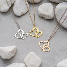 ♥ Intertwined Heart Necklace ♥ H O W ∙ T O ∙ O R D E R 1- Select your preferred Finish from the menu. 2- Choose your necklace length. 3- Write the Names with corresponding Birthstones you want on your necklace. PRODUCT ∙ DETAILS * Heart Dimension is 22.50 mm by 21.50mm * Chain sizes range from 14-22 inches * Font name: Script Mt Bold * Maximum 3 Names, 10 Letters Max Each W H Y ∙ CHOOSE ∙ THIS ∙ GLAMORISTIC ∙ NECKLACE? * Designed with unique and delicate style * Meticulously crafted with your ch Heart-shaped Friendship Necklaces With Adjustable Chain, Heart-shaped Friendship Necklace With Adjustable Chain, Friendship Heart Necklace With Adjustable Chain, Heart-shaped Adjustable Chain Necklace For Friendship, Friendship Necklace With Heart Pendant And Charm, Friendship Necklace With Heart Pendant, Valentine's Day Necklace With Heart Charm For Friendship, Customized Pendant Necklaces For Valentine's Day, Valentine's Day Silver Necklace