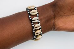 Cowrie shell bracelets, African bracelet, Sea Shell bracelet, Wrist bracelet, Tribal bracelet, Boho bracelet, Gift for her, Moms gift It is made of sea shells which are dried and then made to a beatiful bracelet. **3-5 days delivery via Dhl Express** It can fit any wrist size Free shipping on additional items in your cart White Shell Friendship Bracelets As Gift, Handmade Shell Bracelet For Gifts, Handmade White Shell Friendship Bracelets, Cowrie Shell Beaded Bracelets As Gift, Beaded Shell Bracelets As Gifts, Handmade Shell Bracelets As Gifts, Beaded Shell Bracelet As Gift, Handmade Shell Bracelets Gift, Handmade Shell Bracelet Gift