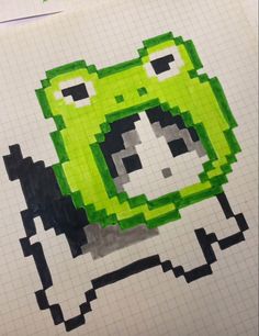 an image of a pixellated drawing of a green frog with big eyes and nose