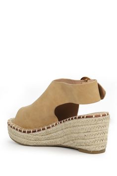 A woven espadrille wedge heel brings summery vibes to this chic sandal, finished with a peep toe and buckle strap closure. Sizing: True to size. 2.5" heel, 2" platform Espadrille wedge heel PU upper, manmade sole Imported This item cannot be shipped to Canada. Beach Straw Wedge Sandals With Cork-bed Midsoles, Chic Open Toe Wedge Sandals For Vacation, Leather Wedge Heel Sandals For Beach Season, Summer Wedge Sandals With Cork-bed Midsoles For Vacation, Summer Vacation Slingback Sandals With Block Heel, Closed Toe Sandals With Stacked Heel For Summer, Summer Sandals With Stacked Heel And Closed Toe, Straw Sandals With Cork-bed Midsoles For Summer, Spring And Summer Style Open Toe Wedge Sandals