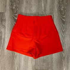 These Shorts Feature A Seamed Detail On The Front And Back, Welt Back Pockets, Front Zipper With Eyelet Hook Closure And A High Waist. Measurements Waist - 13” Rise - 11.5” Length- 4” Color - Orange Size - Xsmall Condition - Nwot Casual Solid Color Shorts For Party, Red High-waisted Shorts For Party, Red High-waisted Shorts For Night Out, Chic Red High-waisted Shorts, Red Short Length Bottoms For Party, Red Party Bottoms In Short Length, Red Party Bottoms Of Short Length, Zara Party Bottoms With Short Length, Chic Stretch Red Shorts