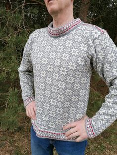 Knitted wool sweater for men, classic and elegant Nordic design. Traditional Kihnu troi pattern. The sweater is knitted from 100% wool yarn, it is perfect protection from gold. There are 3 sizes available.  This sweater is a unique - unisex model. Especially good match to men. Nordic pattern. The Troi is a traditional sweater from the Kihnu island of Estonia. Madder red bands are believed to provide the wearer with protection and well-being. There are used 2 color combined yarn patterns: the mai Kihnu Island, Traditional Sweater, Nordic Star, Yarn Patterns, Sweater For Men, Men Classic, Red Band, Blue Dot, Nordic Design