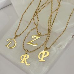 CURSIVE INITIAL STEEL MINI necklace Gold Metal Necklace For Gift, Gold Rope Chain Necklace As A Gift, Gold Pendant Initial Necklace, Gold Necklace With Initial Pendant Chain, Gold Pendant Name Necklace, Gold Chain Name Necklace For Gift, Gold Initial Pendant Chain Necklace, Gold Metal Initial Pendant Necklace, Gold Minimalist Initial Necklace In Stainless Steel