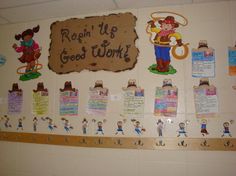 a bulletin board that has some writing on it and pictures hanging up against the wall