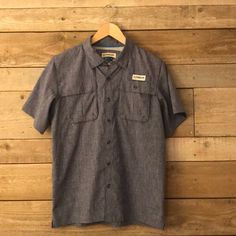 Magellan Outdoors Brand Nwot Size Youth Xl/18-20 Denim Blue Color Relaxed Fit Dark Wash Summer Shirt With Pockets, Blue Chambray Collared Tops, Casual Navy Short Sleeve Shirt For Summer, Casual Navy Collared Short Sleeve Shirt, Blue Collared Chambray Top, Dark Wash Collared Top For Summer, Indigo Cotton Tops With Pockets, Navy Casual Camp Shirt For Summer, Casual Navy Camp Shirt For Summer