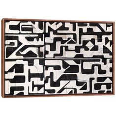 a black and white artwork piece with geometric designs on the front, in an abstract manner