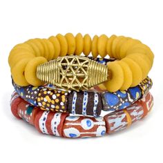 This African bracelet set will definitely turn heads! The handmade glass krobo bead bracelet set is a must have! This will be a great product to add to your collection! Get all 3 for less! Measurement: 8.5in circumference Hardware:  Krobo Glass Beads, Brass Beads and wood beads Color: Yellow, red, gold and brown African Beaded Bracelets, African Bracelet, African Brass Beads, Brown Note, African Bracelets, Red And Brown, Brass Beads, Beads Bracelet Design, Bead Set