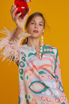 Dress featured a flattering A-line silhouette, mini length, and bold printed design that will make you stand out from the crowd. Dress With Feather Trim, Mini Tunic Dress, Resort Living, Resort 2024, Feather Trim, Feel Beautiful, Cool Summer, Resort Collection, Endless Summer