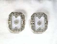 "Offering an exquisite, so hard to find pair of vintage high-end, very collectible designer \"Judith Jack\" Sterling Silver camphor glass and genuine marcasite earrings perfect for the Bride.   It's so tough to find camphor glass earrings at all but to find them with marcasites is a rare treat.  I really love the elegant design! The ornate rectangular shaped sterling silver settings are home to thick oval camphor glass with radial, \"sunray\" designs cut in the glass. The center is adorned with Antique Jeweled Jewelry For Wedding, Vintage Silver Bridal Earrings For Formal Occasions, Silver Vintage Bridal Earrings For Formal Occasions, Vintage Silver Bridal Earrings For Evening, Vintage Antique Silver Earrings For Wedding, Vintage Antique Silver Wedding Earrings, Victorian Silver Bridal Earrings For Formal Events, Victorian Silver Bridal Earrings For Formal Occasions, Victorian Bridal Earrings For Anniversary