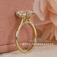 a close up of a gold ring with diamonds on it