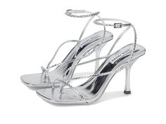 Steve Madden Annie-R Heeled Sandal - Women's Shoes : Silver : Step out for the evening party or festive day in a sleek and chic style, wearing the Steve Madden Annie-R Heeled Sandals. Strappy rhinestone-embellished synthetic upper. Synthetic lining and insole. Adjustable buckle closure on the ankle strap. Open square toe. Slender stiletto heel. Synthetic midsole. Synthetic outsole. Imported. Measurements: Heel Height: 3 3 4 in Product measurements were taken using size 7, width M. Please note th Glamorous Sparkling Formal Sandals, Glamorous Sandals With Buckle Closure And Single Toe Strap, Glamorous Evening Sandals With Single Toe Strap, Glamorous Party Sandals With Single Toe Strap, Holiday Evening Sandals With Heel Strap, Glamorous Sandals With Single Toe Strap For Events, Glamorous Sandals With Heel Loop For Events, Glamorous Single Toe Strap Sandals For Events, Party Sandals With Rhinestones And Single Toe Strap