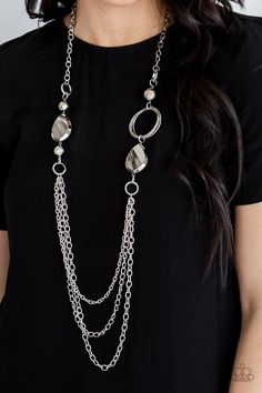 A mismatched collection of oversized silver beads, hoops, and textured silver accents give way to layers of antiqued silver chains down the chest for an edgy industrial look. Features an adjustable clasp closure. Sold as one individual necklace. Includes one pair of matching earrings. Silver Chains, Long Chain Necklace, Paparazzi Accessories, Black Necklace, Silver Accessories, Paparazzi Jewelry, Silver Accents, Brass Chain, Necklace Earring Set