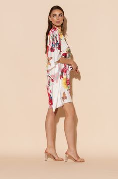 This is one Bouquet you won't want to throw away! Vibrant blooms of flora and fauna adorn this short caftan with tie waist in our signature Polysilk fabric. Dance the night away or lounge in luxe - the occasions are endless with this beautiful, blossoming statement piece. Printed short caftan Can be worn loose or cinched at the waist Comes with a matching belt as an option for styling Lusciously soft poly-silk blend for ease of care Machine wash cool Tumble-dry low Flowy Spring Sleepwear For Vacation, Flowy Sleepwear For Spring Vacation, Summer Daywear Dresses With Kimono Sleeves, Spring Kaftan With Kimono Sleeves For Loungewear, Spring Loungewear Kaftan With Kimono Sleeves, Chic Short Sleeve Spring Sleepwear, Spring Beach Cover-up Kaftan With Tie Waist, Spring Vacation Kaftan With Tie Waist, Spring Beachwear Kaftan With Tie Waist