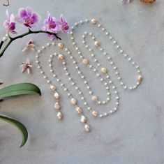 Long Cultured Freshwater Pearl Beaded Wire Necklace. Pearl - Etsy Pearl Lariat Necklace With Beaded Pearl Chain, White Lariat Backdrop Necklace With Pearl Charm, Pearl Long Necklace With Pearl Chain For Wedding, Pearl Long Necklace For Wedding, Wedding Long Pearl Necklace With Pearl Chain, Single Strand Pearl Lariat Necklace, Pearl Lariat Beaded Necklace, Long Beaded Necklace With Pearl Drop For Wedding, Beaded Lariat Pearl Necklace