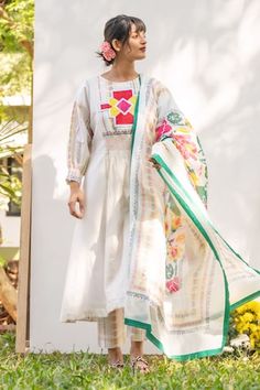 White anarkali featuring embroidered front yoke with Portuguese folk print on the back. Paired with a printed pant and a dupatta. - Aza Fashions Anarkali Lawn Suit With Embroidered Border And Long Sleeves, Anarkali Floral Embroidered Dupatta For Navratri, Navratri Anarkali Dupatta With Floral Embroidery, Embroidered Anarkali Lawn Suit With Traditional Drape, Transitional Anarkali Dupatta With Multicolor Embroidery, Bohemian Anarkali Set With Embroidered Border, Designer Multicolor Embroidered Anarkali Set, Bohemian Chanderi Anarkali Set With Embroidered Border, Anarkali Lawn Suit With Embroidered Border