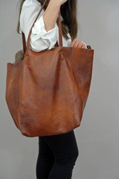 Brand Name: MR.YLLSShape: Casual ToteHandbags Type: Shoulder BagsTypes of bags: Shoulder HandbagsOrigin: CN(Origin)Main Material: PUClosure Type: OPENHardness: SoftExterior: NONEStyle: CasualLining Material: Synthetic LeatherOccasion: VersatileGender: WOMENPattern Type: SolidNumber of Handles/Straps: SingleInterior: Cell Phone PocketDecoration: NONEItem Type: Handbags Slouchy Tote, Leather Cosmetic Bag, Large Leather Bag, Everyday Handbag, Large Leather Tote Bag, Soft Leather Bag, Oversized Tote Bag, Oversized Bag, Oversized Tote