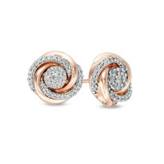 A mesmerizing look, these diamond stud earrings complement most any attire. Created in precious 10K rose gold, each earring features a shimmering diamond composite. The spiral frame glistens with alternating polished and diamond-lined curved ribbons. Radiant with 1/3 ct. t.w. of diamonds and a brilliant buffed luster, these post earrings secure comfortably with friction backs. Earrings Studs Silver, Rose Gold Earrings Studs, The Spiral, Rose Gold Studs, Peoples Jewellers, Drawings Simple, Diamond Stud Earrings, Diamond Stud, Diamond Earrings Studs