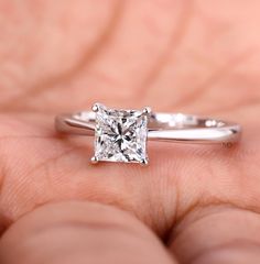 Available in 1 to 2 Carat Diamond Engagement Ring, Princess cut Lab Grown Diamond Rings for Women, Pinched Band, Solitaire Diamond Wedding Rings for Her, Handmade Jewelry ✦𝐋𝐚𝐛-𝐆𝐫𝐨𝐰𝐧 𝐃𝐢𝐚𝐦𝐨𝐧𝐝 𝐑𝐢𝐧𝐠 𝐃𝐞𝐭𝐚𝐢𝐥: * Stone: Princess Cut Lab Grown Diamond * Color/Clarity: EF/VS * Carat Weight & Dimension:    1.00 CT:- 5.50 MM (listed size)    1.50 CT:- 6.35 MM    2.00 CT:- 6.90 MM  * Bandwidth: 1.90 MM | Thickness: 1.70 MM * SKU: MDR-0024 ✦𝐂𝐞𝐫𝐭𝐢𝐟𝐢𝐜𝐚𝐭𝐞: We offer an IGI cert Platinum Princess Cut Engagement Ring, Silver Princess Cut Engagement Ring, Platinum Diamond Ring With Brilliant Square Cut, Simple Princess Cut Engagement Rings, Minimalist Princess Cut Solitaire Diamond Ring, Square Diamond Engagement Rings, Timeless Solitaire Diamond Ring Princess Cut, 14k White Gold Solitaire Princess Cut Rings, Wedding Rings For Her