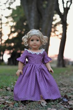 This dress is styled after fashion from the 1840's. It has a fitted bodice with princess seams, a dropped waist and wide neckline. The neckline is edged in ivory colored lace. The short sleeves are fitted, with a fabric ruffle at the hem. The bodice is lined with cotton, and the dress closes with metal snaps in the back. This listing is for the dress only. Doll and props are not included. Thank you for visiting Past Elegance Co! Dress is made with the 'Jane Eyre' pattern from Pemberley Threads Girl. 1800's Dress, Jane Eyre, Princess Seams, Princess Seam, Ivory Color, Fitted Bodice, Petticoat, Lancaster, Style Dress