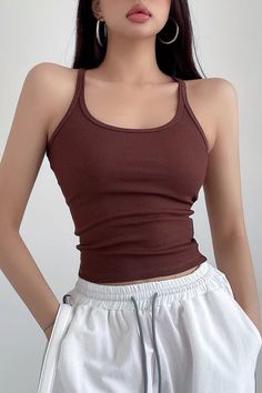 Item Type: TopMaterial: PolyesterPattern: SolidCollar: Round NeckSleeve Length: SleevelessColor: Black. White. Brown. GraySize: S.M Size(cm) Top Length Bust S 49 60 M 50 64 Cotton Halter Neck Tank Top, Brown Summer Workout Tops, Sleeveless Brown Seamless Crop Top, Fitted Sleeveless Tank Top Casual, Brown Fitted Cami Tank Top, Fitted Casual Racerback Camisole, Fitted Sleeveless Casual Tank Top, Casual Fitted Racerback Camisole, Brown Stretch Halter Neck Tank Top